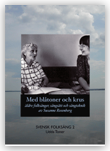 Med bl&aring;toner och krus